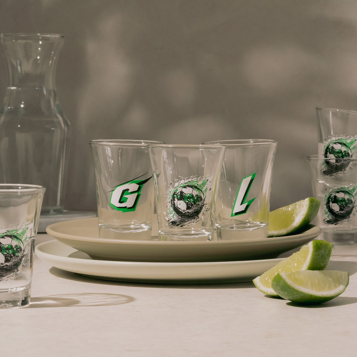 Tres copas de shots formando la palabra Gol en su diseño