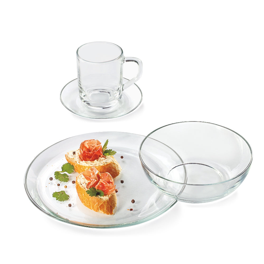 Cuatro piezas de la vajilla stylo transparente: plato hondo, taza, plato té, plato pando